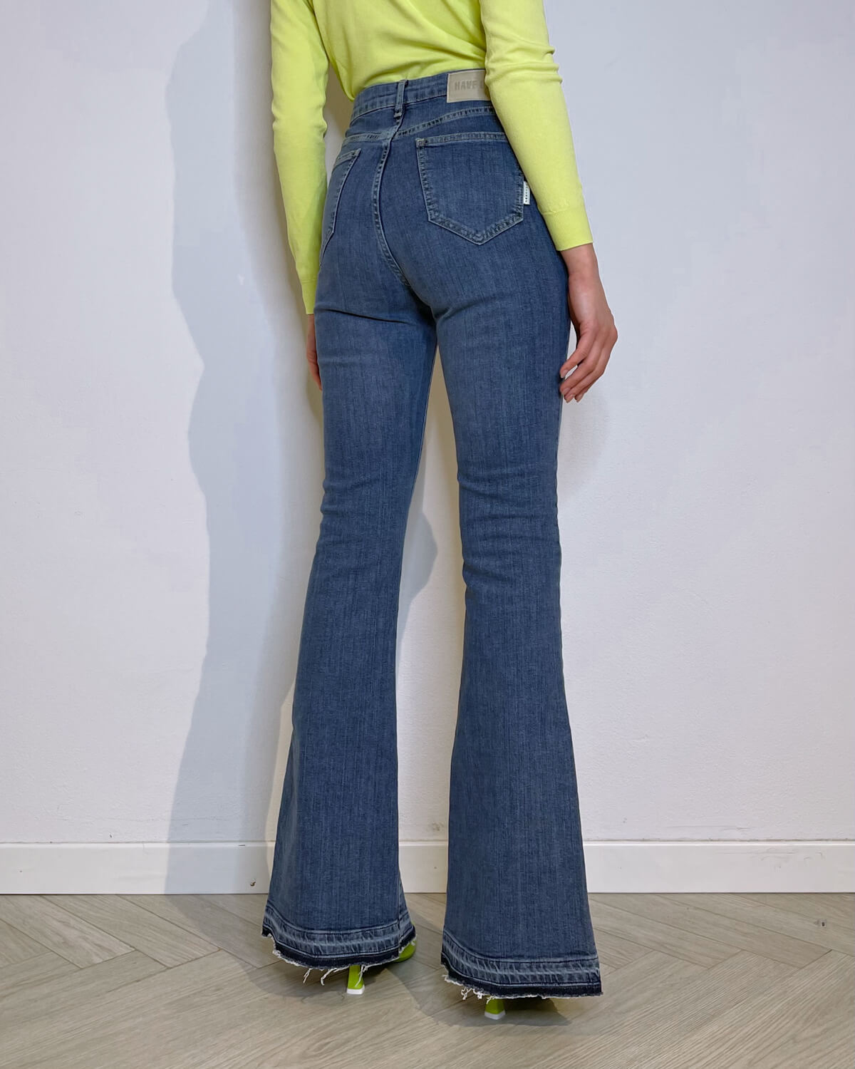 JEANS FLARE CON SPACCHI - Mirror Clothing